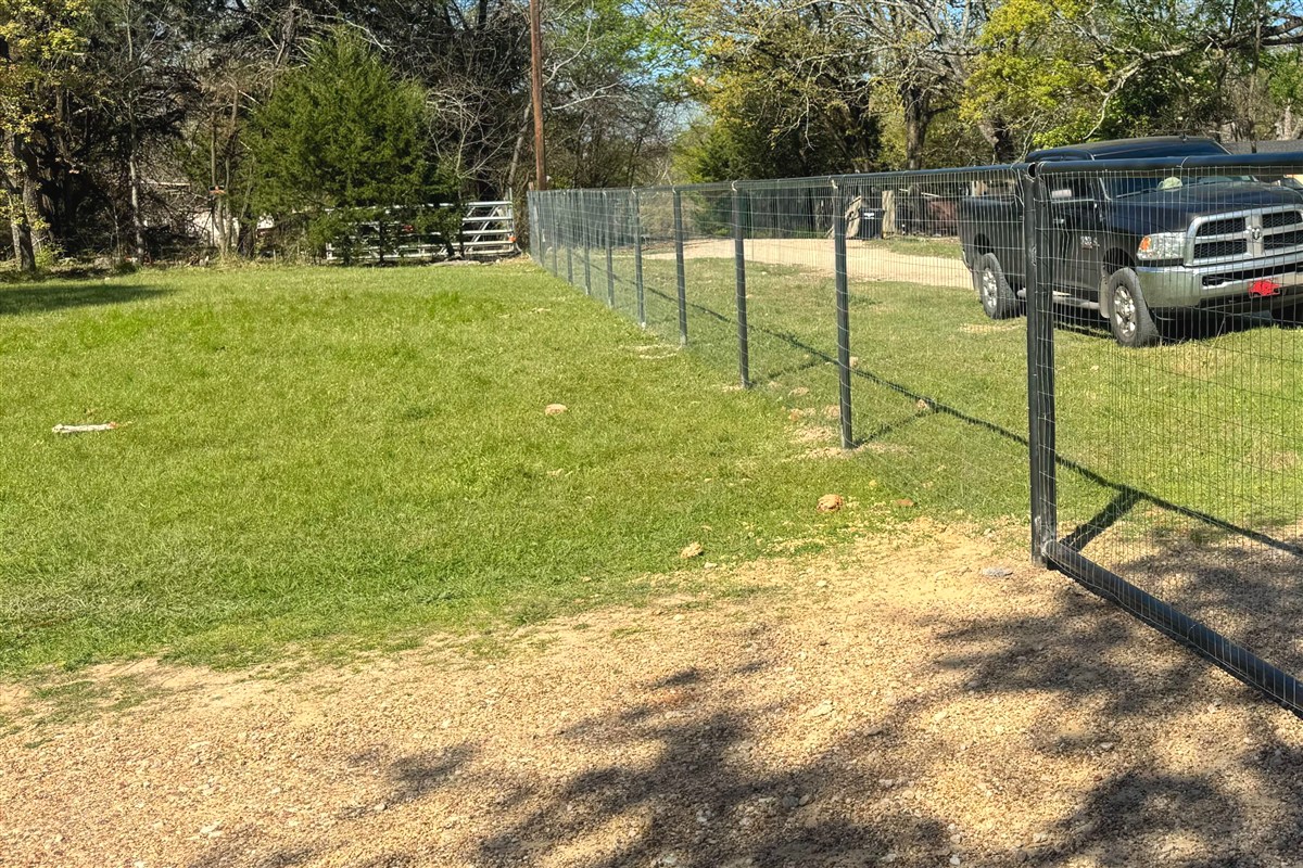 Chain-link fence and swing gate installation